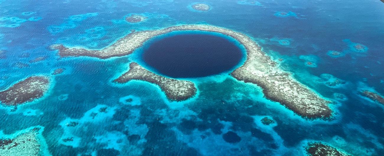 Soaring Above the Great Blue Hole - The Ultimate Helicopter Tour